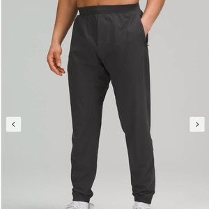 NWOT Lululemon Men's Surge Joggers (size small) gray